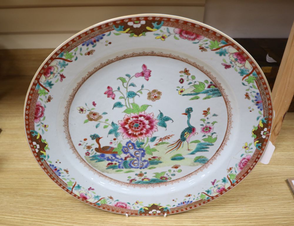 A Chinese double peacock famille rose charger, 18th century, diameter 41cm